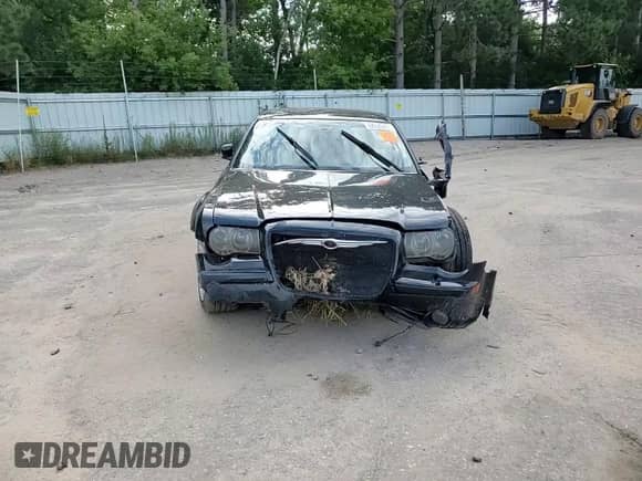 2006 Chrysler 300 C SRT-8 z VIN 2C3LA73W86H340377, wystawiony jako Copart lot #68520435 z przebiegiem 97 573 mil mil oraz Szkoda całkowita • Salvage title. Historia ofert i sprzedaży dostępna na DreamBid. Obrazek 13.