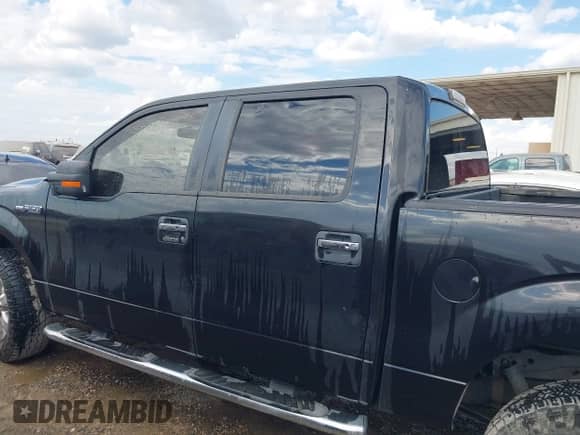 2014 Ford F-150 XLT with VIN 1FTFW1EF9EKD51674, listed as a IAAI auction lot 43359729 with 223,352 mi miles and . Bid and sale history available at DreamBid. Image 14.