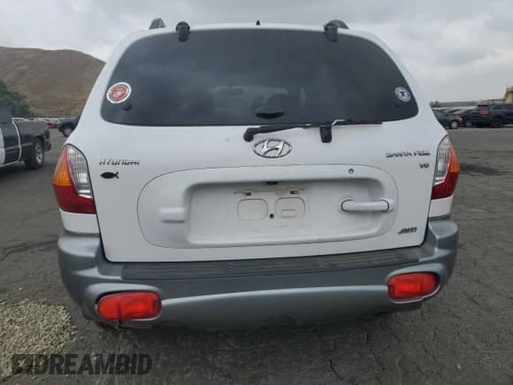 2002 Hyundai Santa Fe GLS с VIN KM8SC73D02U311622, выставлен на аукционе Copart как лот 71742874 с пробегом 99 807 миль миль и Списание • Salvage title. История ставок и продаж доступна на DreamBid. Изображение 6.