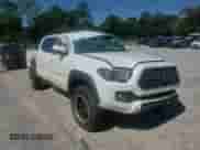 2019 Toyota Tacoma TRD Off Road z VIN 3TMCZ5AN9KM282522, wystawiony jako Copart lot #85939905 z przebiegiem 89 447 mil mil oraz Nie do naprawy • Non repairable. Historia ofert i sprzedaży dostępna na DreamBid. Obrazek 13.
