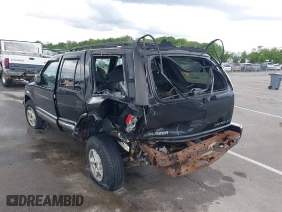 2000 Chevrolet Blazer LS with VIN 1GNDT13W2Y2297715, listed as a IAAI auction lot 42315268 with 198,508 mi miles and . Bid and sale history available at DreamBid. Image 6.