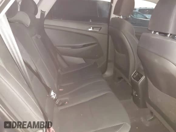 2019 Hyundai Tucson Sport z VIN KM8J33AL7KU901296, wystawiony jako IAAI lot #41132884 z przebiegiem 76 948 mil mil oraz . Historia ofert i sprzedaży dostępna na DreamBid. Obrazek 8.