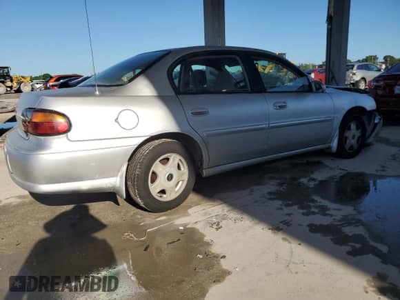 2001 Chevrolet Malibu LS с VIN 1G1NE52J716122131, выставлен на аукционе Copart как лот 81442225 с пробегом 49 948 миль миль и Списание • Salvage title. История ставок и продаж доступна на DreamBid. Изображение 3.