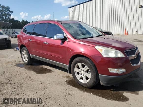 2011 Chevrolet Traverse 1LT with VIN 1GNKRGED9BJ295347, listed as a Copart auction lot 81428605 with 177,667 mi miles and Salvage title. Bid and sale history available at DreamBid. Image 4.