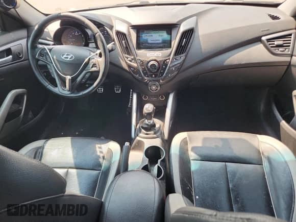 2013 Hyundai Veloster Turbo с VIN KMHTC6AE5DU169202, выставлен на аукционе Copart как лот 69867375 с пробегом 72 944 миль миль и Списание • Salvage title. История ставок и продаж доступна на DreamBid. Изображение 8.