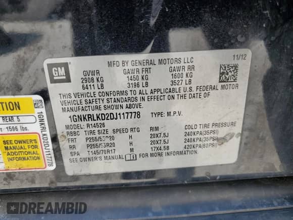 2013 Chevrolet Traverse LTZ z VIN 1GNKRLKD2DJ117778, wystawiony jako Copart lot #61408935 z przebiegiem 160 438 mil mil oraz Szkoda całkowita • Salvage title. Historia ofert i sprzedaży dostępna na DreamBid. Obrazek 13.