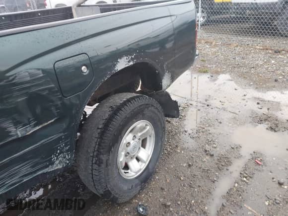 2000 Toyota Tacoma with VIN 4TAWM72N6YZ683194, listed as a IAAI auction lot 42113384 with 174,601 mi miles and . Bid and sale history available at DreamBid. Image 13.