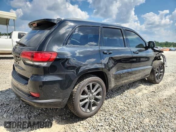 2018 Jeep Grand Cherokee Overland with VIN 1C4RJFCG0JC123233, listed as a Copart auction lot 69979575 with 96,633 mi miles and Salvage title. Bid and sale history available at DreamBid. Image 3.