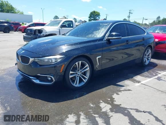 2019 BMW 4 Series 430i with VIN WBA4J1C56KBM12018, listed as a IAAI auction lot 42188293 with 87,352 mi miles and . Bid and sale history available at DreamBid. Image 17.