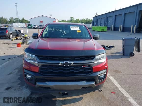 2021 Chevrolet Colorado 4WD Z71 z VIN 1GCGTDEN4M1113032, wystawiony jako IAAI lot #42410079 z przebiegiem 45 329 mil mil oraz . Historia ofert i sprzedaży dostępna na DreamBid. Obrazek 13.