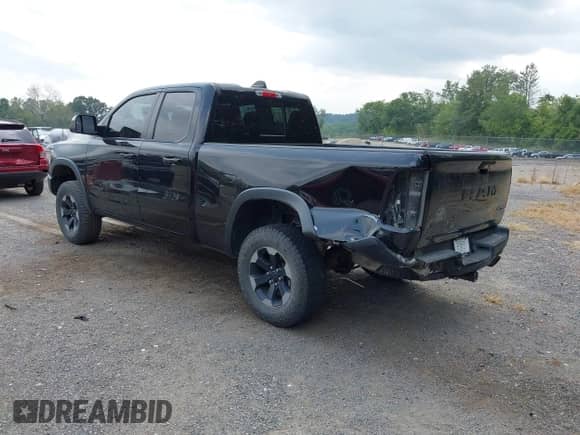 2019 Ram 1500 Rebel z VIN 1C6SRFET2KN705108, wystawiony jako IAAI lot #43163417 z przebiegiem 110 932 mil mil oraz . Historia ofert i sprzedaży dostępna na DreamBid. Obrazek 3.