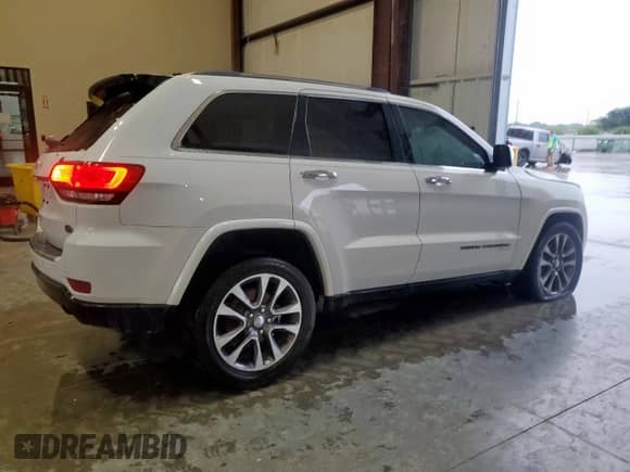 2017 Jeep Grand Cherokee Overland with VIN 1C4RJECG9HC916342, listed as a Copart auction lot 60658285 with 59,470 mi miles and Salvage title. Bid and sale history available at DreamBid. Image 3.