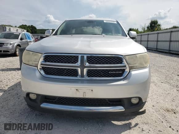 2011 Dodge Durango Crew with VIN 1D4RE4GG8BC725501, listed as a Copart auction lot 68695085 with 162,876 mi miles and Salvage title. Bid and sale history available at DreamBid. Image 5.