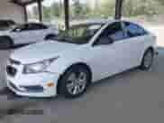 2016 Chevrolet Cruze LS z VIN 1G1PC5SH1G7221655, wystawiony jako IAAI lot #43140380 z przebiegiem 129 315 mil mil oraz . Historia ofert i sprzedaży dostępna na DreamBid. Obrazek 2.