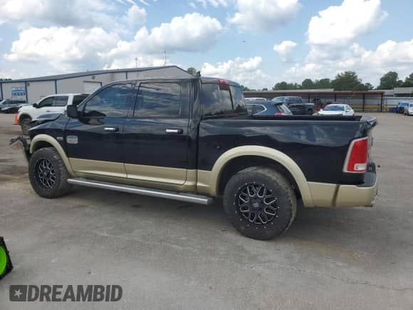 2014 Ram 1500 Longhorn z VIN 1C6RR7PTXES479469, wystawiony jako Copart lot #67517725 z przebiegiem 189 231 mil mil oraz Szkoda całkowita • Salvage title. Historia ofert i sprzedaży dostępna na DreamBid. Obrazek 2.