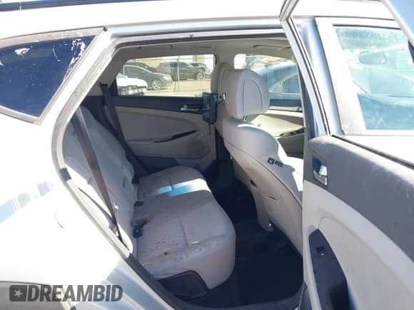 2017 Hyundai Tucson Sport with VIN KM8J33A21HU580324, listed as a IAAI auction lot 41651502 with 128,435 mi miles and . Bid and sale history available at DreamBid. Image 8.