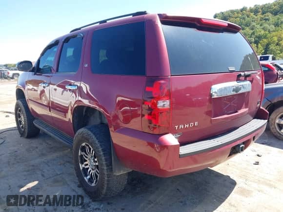 2007 Chevrolet Tahoe LT with VIN 1GNFK13027R310184, listed as a IAAI auction lot 43160370 with 241,763 mi miles and . Bid and sale history available at DreamBid. Image 3.