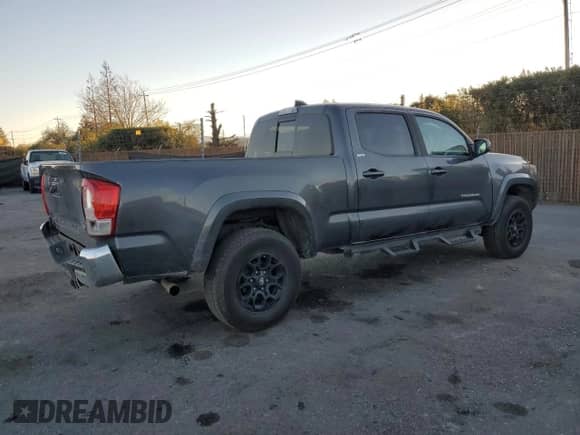 2020 Toyota Tacoma SR5 с VIN 3TMBZ5DN5LM023888, выставлен на аукционе Copart как лот 84208174 с пробегом 131 858 миль миль и Списание • Salvage title. История ставок и продаж доступна на DreamBid. Изображение 3.
