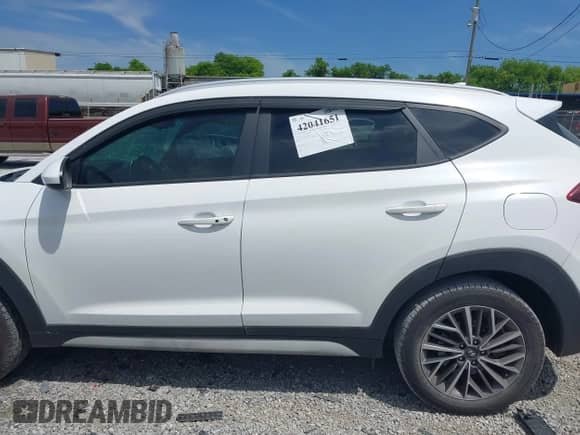 2019 Hyundai Tucson Sport z VIN KM8J33AL5KU066119, wystawiony jako IAAI lot #42041651 z przebiegiem 60 281 mil mil oraz . Historia ofert i sprzedaży dostępna na DreamBid. Obrazek 14.