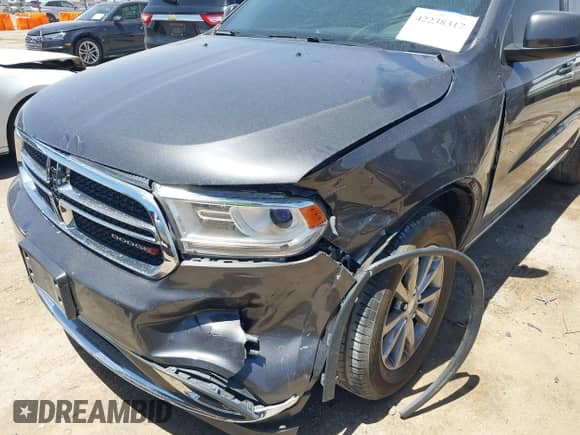 2018 Dodge Durango SXT with VIN 1C4RDJAG9JC312671, listed as a IAAI auction lot 42238317 with 73,561 mi miles and . Bid and sale history available at DreamBid. Image 6.