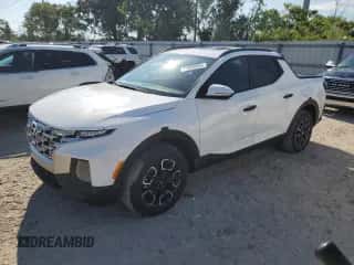 2024 Hyundai Santa Cruz SEL с VIN 5NTJC4DE5RH119902, выставлен на аукционе Copart как лот 71050654 с пробегом 2 758 миль миль и На запчасти • Non repairable. История ставок и продаж доступна на DreamBid. Изображение 1.
