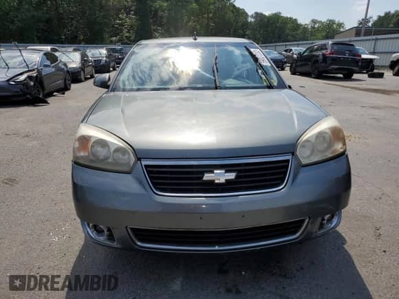 2006 Chevrolet Malibu Maxx LTZ с VIN 1G1ZU638X6F152270, выставлен на аукционе Copart как лот 59831233 с пробегом Не указан миль и Списание • Salvage title. История ставок и продаж доступна на DreamBid. Изображение 5.