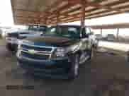 2015 Chevrolet Tahoe LS with VIN 1GNSCAKC0FR711917, listed as a IAAI auction lot 43241350 with 181,124 mi miles and . Bid and sale history available at DreamBid. Image 2.