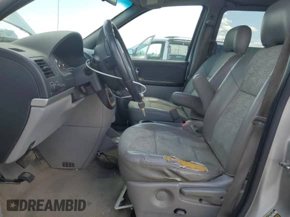 2005 Saturn Relay 3 with VIN 5GZDV23LX5D212066, listed as a Copart auction lot 58051305 with 128,234 mi miles and Salvage title. Bid and sale history available at DreamBid. Image 7.
