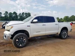 2012 Toyota Tundra Limited z VIN 5TFHW5F12CX244923, wystawiony jako Copart lot #69113405 z przebiegiem 213 806 mil mil oraz Szkoda całkowita • Salvage title. Historia ofert i sprzedaży dostępna na DreamBid. Obrazek 1.