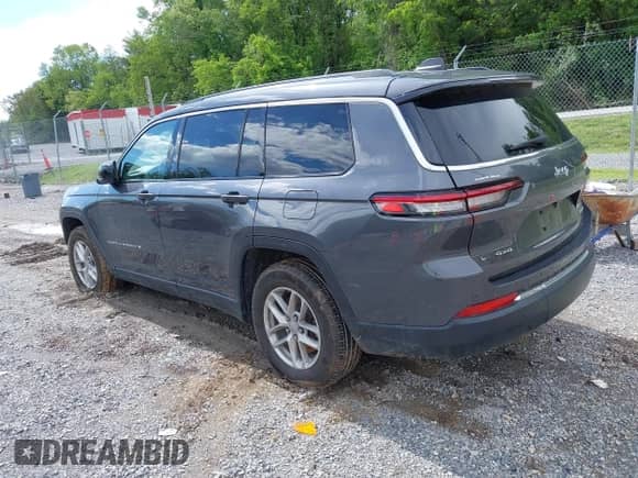 2023 Jeep Grand Cherokee Laredo with VIN 1C4RJKAG1P8710032, listed as a IAAI auction lot 42241432 with 20,680 mi miles and . Bid and sale history available at DreamBid. Image 3.