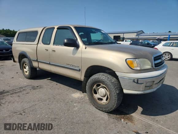 2002 Toyota Tundra SR5 z VIN 5TBRN34102S254202, wystawiony jako Copart lot #71814075 z przebiegiem 167 582 mil mil oraz Szkoda całkowita • Salvage title. Historia ofert i sprzedaży dostępna na DreamBid. Obrazek 4.