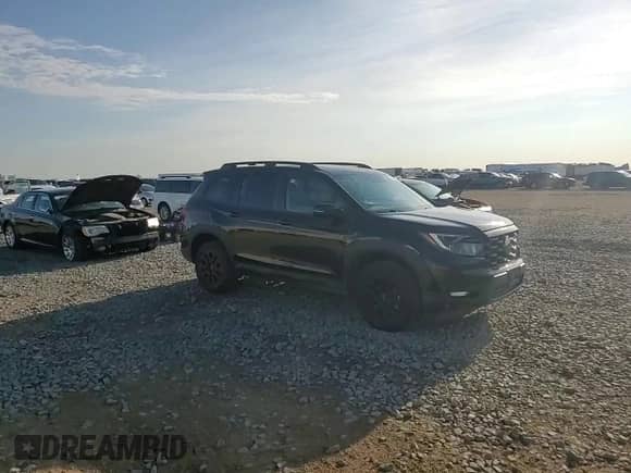 2022 Honda Passport TrailSport with VIN 5FNYF8H60NB004258, listed as a Copart auction lot 69569925 with 58,639 mi miles and Salvage title. Bid and sale history available at DreamBid. Image 14.