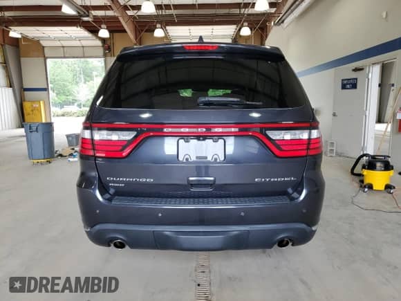 2014 Dodge Durango Citadel z VIN 1C4SDJET9EC592347, wystawiony jako Copart lot #65735625 z przebiegiem 105 752 mil mil oraz Szkoda całkowita • Salvage title. Historia ofert i sprzedaży dostępna na DreamBid. Obrazek 6.