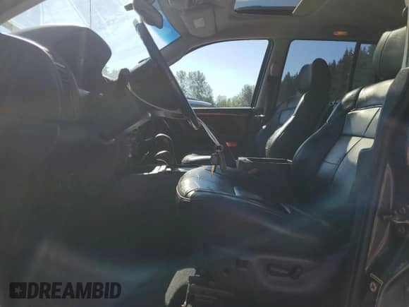 2002 Jeep Grand Cherokee Limited z VIN 1J8GW58J32C256389, wystawiony jako Copart lot #80217465 z przebiegiem 129 610 mil mil oraz Szkoda całkowita • Salvage title. Historia ofert i sprzedaży dostępna na DreamBid. Obrazek 7.