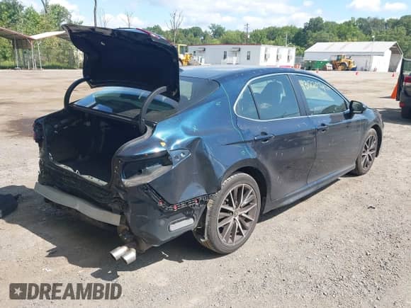2021 Toyota Camry SE Nightshade z VIN 4T1G11AKXMU523439, wystawiony jako IAAI lot #43122074 z przebiegiem 66 261 mil mil oraz . Historia ofert i sprzedaży dostępna na DreamBid. Obrazek 4.
