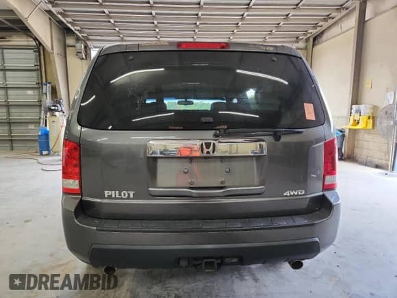 2011 Honda Pilot EX-L z VIN 5FNYF4H7XBB084519, wystawiony jako Copart lot #68644595 z przebiegiem 186 578 mil mil oraz Szkoda całkowita • Salvage title. Historia ofert i sprzedaży dostępna na DreamBid. Obrazek 6.