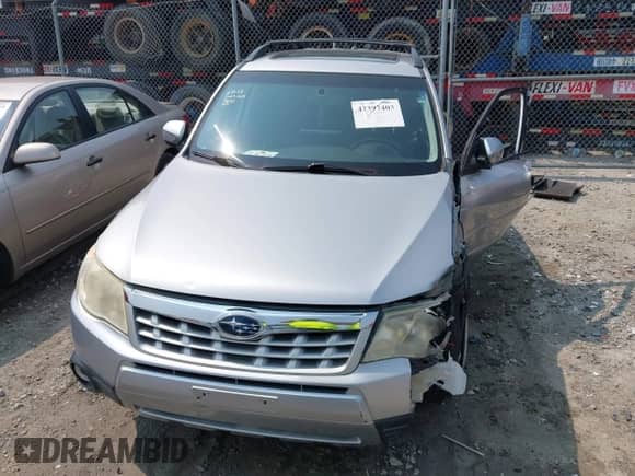 2013 Subaru Forester X Limited with VIN JF2SHAEC2DH441521, listed as a IAAI auction lot 42397403 with 130,000 mi miles and . Bid and sale history available at DreamBid. Image 12.