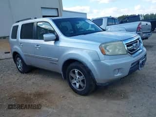 2009 Honda Pilot Touring with VIN 5FNYF38829B024103, listed as a IAAI auction lot 43415873 with 258,158 mi miles and . Bid and sale history available at DreamBid. Image 1.