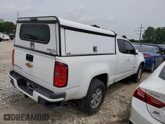 2020 Chevrolet Colorado 2WD Work Truck z VIN 1GCHSBEN1L1138075, wystawiony jako Copart lot #61840065 z przebiegiem 122 716 mil mil oraz Szkoda całkowita • Salvage title. Historia ofert i sprzedaży dostępna na DreamBid. Obrazek 3.
