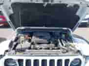 2021 Jeep Wrangler Unlimited Sahara z VIN 1C4JJXP63MW716690, wystawiony jako IAAI lot #42087879 z przebiegiem 40 889 mil mil oraz . Historia ofert i sprzedaży dostępna na DreamBid. Obrazek 10.