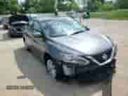 2019 Nissan Sentra SV z VIN 3N1AB7APXKY318044, wystawiony jako Copart lot #67408985 z przebiegiem 107 171 mil mil oraz Szkoda całkowita • Salvage title. Historia ofert i sprzedaży dostępna na DreamBid. Obrazek 14.