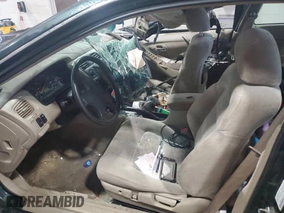 1999 Honda Accord EX with VIN 1HGCG3272XA026660, listed as a Copart auction lot 56629585 with 180,716 mi miles and Salvage title. Bid and sale history available at DreamBid. Image 7.