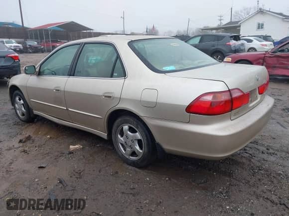 2000 Honda Accord EX with VIN JHMCG5662YC012970, listed as a IAAI auction lot 41577963 with 232,739 mi miles and . Bid and sale history available at DreamBid. Image 3.
