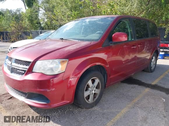 2011 Dodge Grand Caravan Mainstreet with VIN 2D4RN3DG4BR711004, listed as a IAAI auction lot 43235630 with 126,772 mi miles and . Bid and sale history available at DreamBid. Image 2.