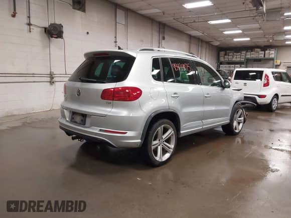2016 Volkswagen Tiguan SEL with VIN WVGBV7AX0GW073628, listed as a IAAI auction lot 43434075 with 134,208 mi miles and . Bid and sale history available at DreamBid. Image 4.