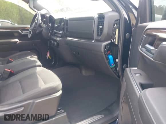 2023 Chevrolet Silverado 1500 LT with VIN 1GCUDDE82PZ232049, listed as a IAAI auction lot 41966595 with 32,605 mi miles and . Bid and sale history available at DreamBid. Image 5.