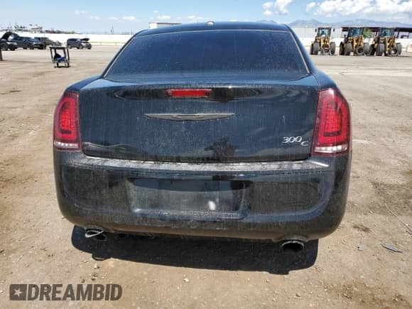 2013 Chrysler 300 C с VIN 2C3CCAET9DH523682, выставлен на аукционе Copart как лот 70926075 с пробегом 99 979 миль миль и Списание • Salvage title. История ставок и продаж доступна на DreamBid. Изображение 6.