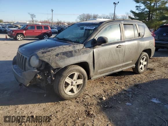 2010 Jeep Compass Sport z VIN 1J4NT1FB8AD671108, wystawiony jako Copart lot #82151454 z przebiegiem 206 413 mil mil oraz Szkoda całkowita • Salvage title. Historia ofert i sprzedaży dostępna na DreamBid. Obrazek 1.