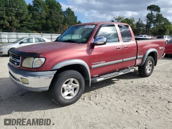 2002 Toyota Tundra SR5 z VIN 5TBRT34152S308664, wystawiony jako Copart lot #84883185 z przebiegiem 126 359 mil mil oraz Szkoda całkowita • Salvage title. Historia ofert i sprzedaży dostępna na DreamBid. Obrazek 1.