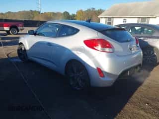 2017 Hyundai Veloster z VIN KMHTC6AD5HU323307, wystawiony jako IAAI lot #43465067 z przebiegiem 13 369 mil mil oraz . Historia ofert i sprzedaży dostępna na DreamBid. Obrazek 3.